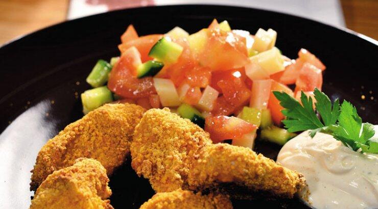 Τραγανές κοτονοστιμιές στο φούρνο με σάλτσα γιαουρτιού