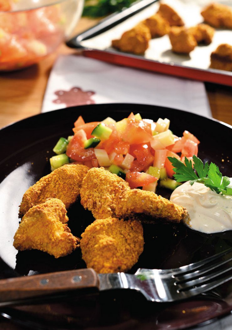 Τραγανές κοτονοστιμιές στο φούρνο με σάλτσα γιαουρτιού